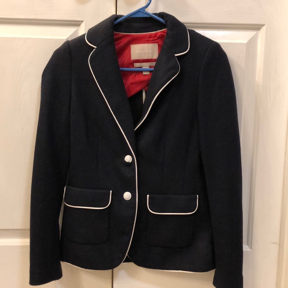 Woman’s navy blue blazer